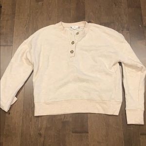 tan button crewneck